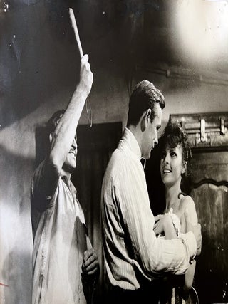 Goldfinger (1964). Four original oversized black & white film stills.